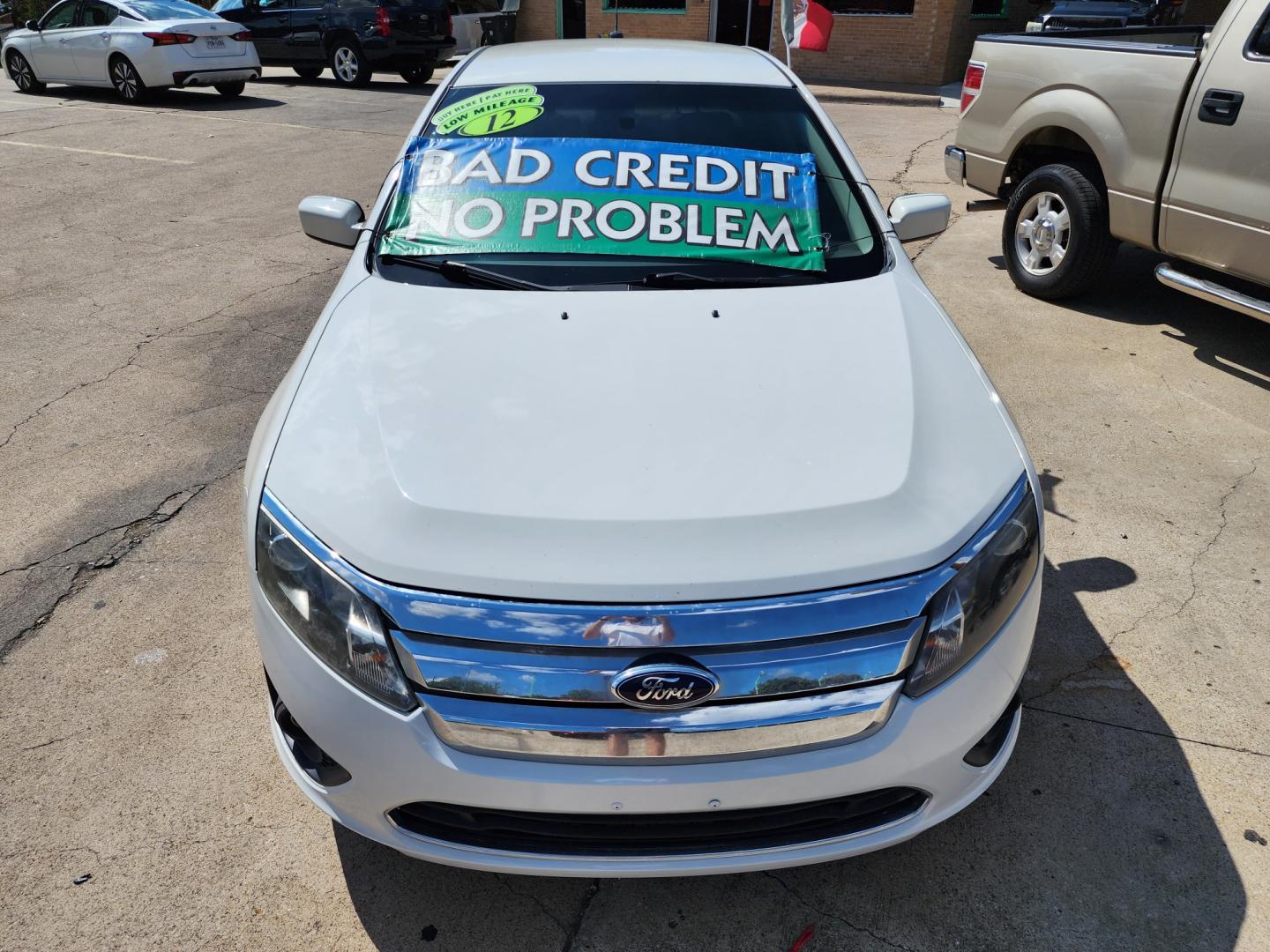 2012 WHITE Ford Fusion se (3FAHP0HG8CR) , AUTO transmission, located at 2660 S.Garland Avenue, Garland, TX, 75041, (469) 298-3118, 32.885551, -96.655602 - Welcome to DallasAutos4Less, one of the Premier BUY HERE PAY HERE Dealers in the North Dallas Area. We specialize in financing to people with NO CREDIT or BAD CREDIT. We need proof of income, proof of residence, and a ID. Come buy your new car from us today!! This is a Super Clean 2012 FORD FUSIO - Photo#8